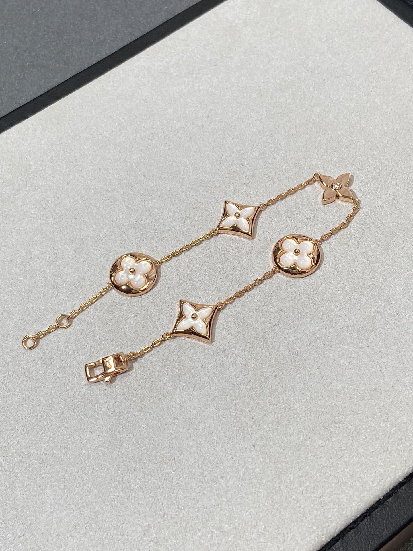 [Loui]STAR AND SUN 5 MOTIF MOP PINK GOLD BRACELET