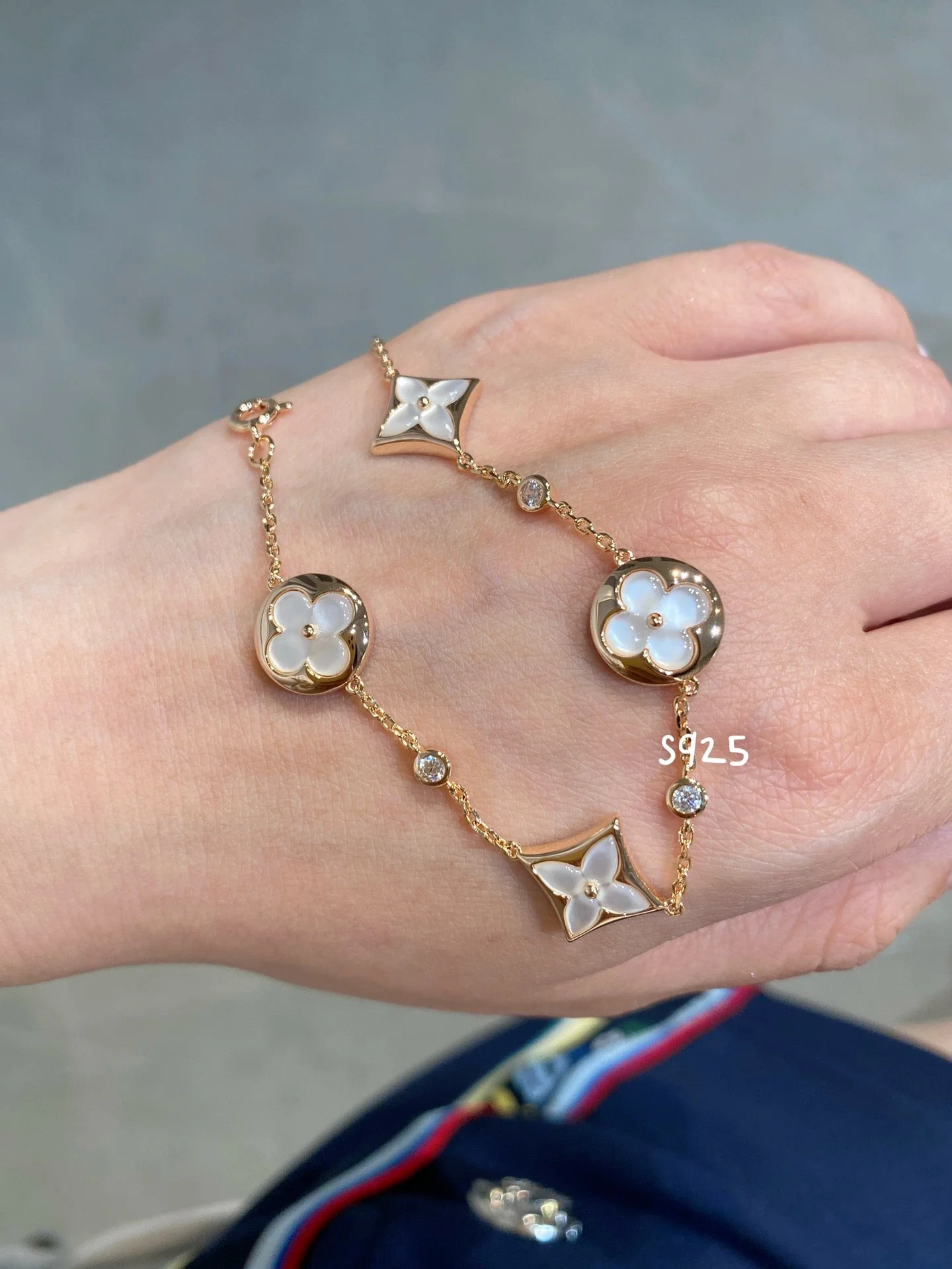 [Loui]STAR AND SUN 4 MOTIF WHITE MOP PINK GOLD BRACELET