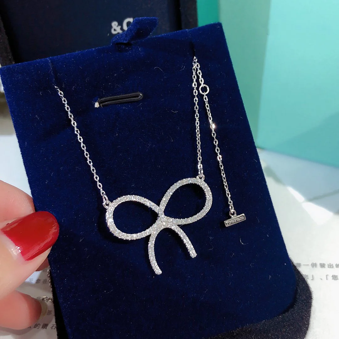 [TF]CLAW SET RHODIUM PLATED BOW NECKLACE