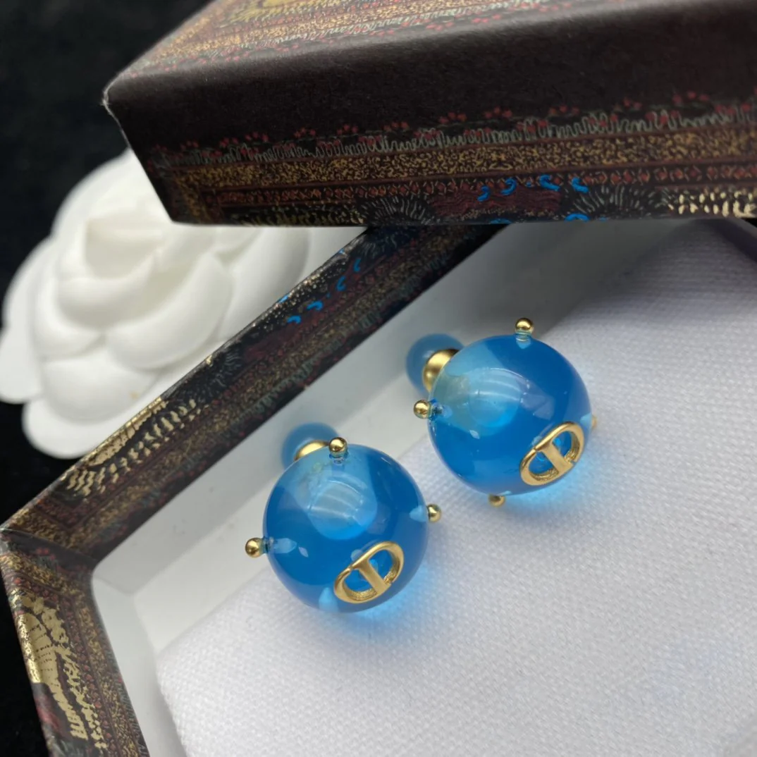 [CD] WOMEN TRIBALES EARRINGS GOLD-FINISH METAL AND LIGHT BLUE