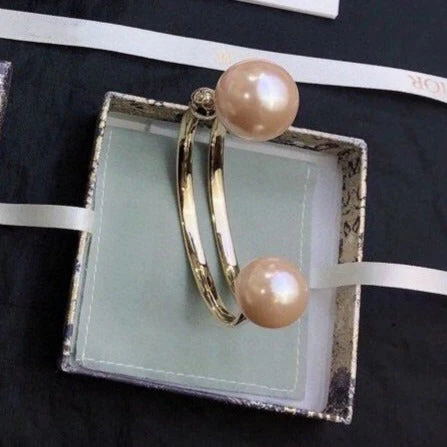 [CD]DIO TRIBALES BANGLE GOLD AND PEARL PINK BRACELET